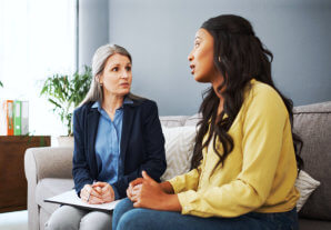 two woman sitting