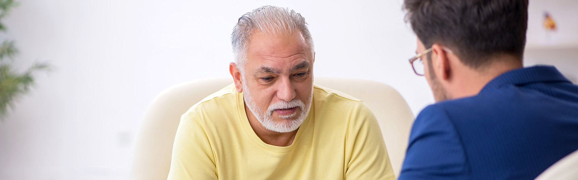 man and senior sitting